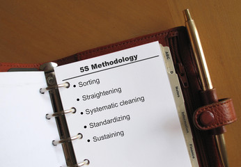 Business concepts 5S Methodology in a personal organizer