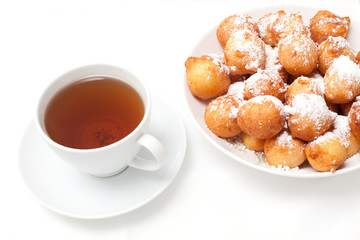 cup of tea and just baked donuts