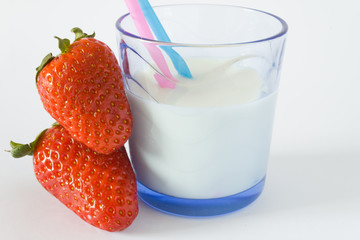 milk with straw and strawberries
