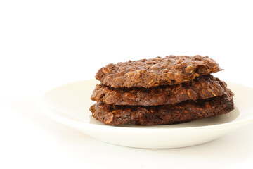 Brown oatmeal cookies on plate