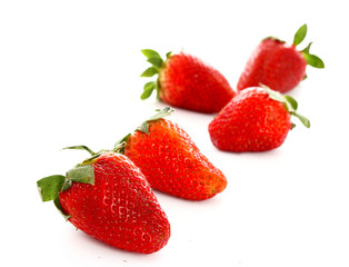 Few strawberries isolated on white