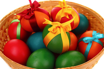 Easter eggs in backet isolated on white