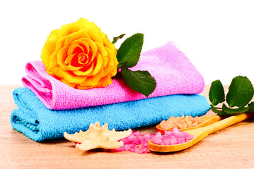 rose petals, bath salt and towel