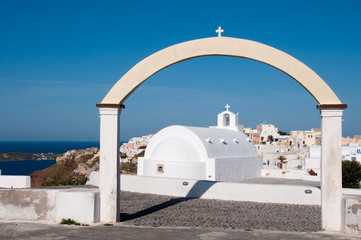 Arch and a chapel in Oia, Santorini, Greece
