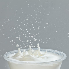 Splash in a milk glass