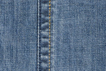 Macro of jeans denim and seam, abstract textile background