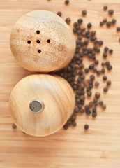 salt and pepper grinders on a table