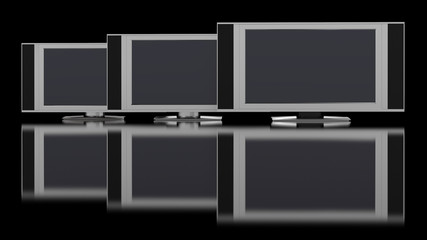 LCD TV against black with ground reflection