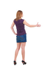 Beautiful young woman handshake . Rear view.