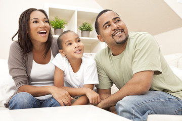 Happy Smiling African American Family At Home