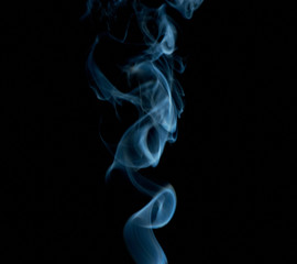 Obraz premium Abstract blueish smoke on black