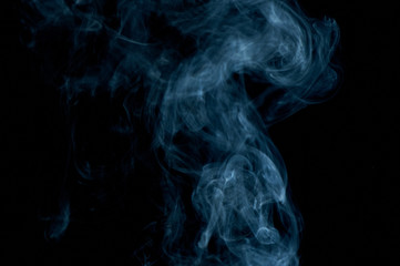 Abstract blueish smoke on black