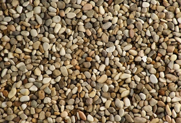 background from the shallow sea pebbles