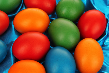 Colorful Easter Eggs on Textile background