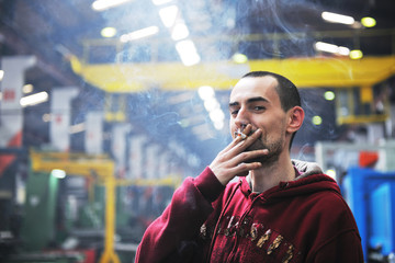 industry worker smoke cigarette