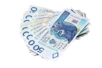 A lot of polish money isolated on white