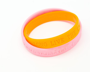 Yellow and pink rubber bracelet