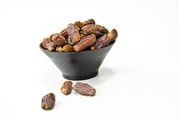 Plate full of Dates Fruit isolated on white Background