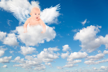 Baby with wings on white, fluffy clouds in blue sky. Collage