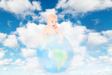 little baby on Earth globe on fluffy clouds in sky collage