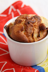 An apple pie on the red cloth