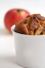 An apple pie on the red cloth