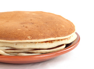 A stack of pancakes on a plate