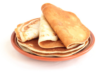A stack of pancakes on a plate