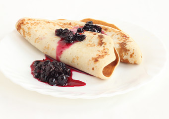 A stack of pancakes on a plate