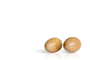 Two wooden Easter eggs isolated on white