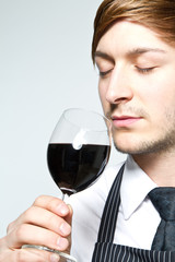 waiter smelling vine