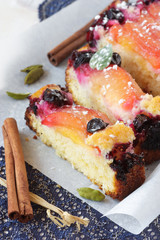 Fruitcake with plums and berries.