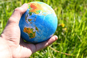 globe in hand