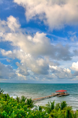 Obraz premium View of the Ocean and a Dock on the Coast of Belize