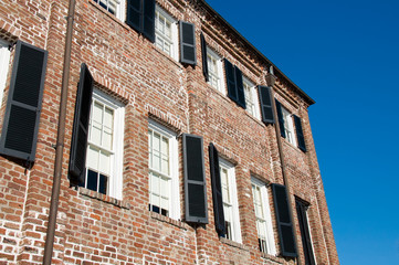 Brick Building with a Clear Blue Sky in the Background
