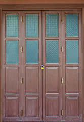 Wooden door set in texture wooden walls