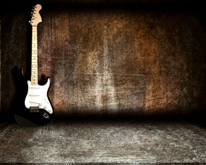 Fototapeta na wymiar gitara w pokoju stali