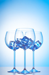 Glasses of water against gradient background