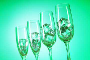 Glasses of water against gradient background