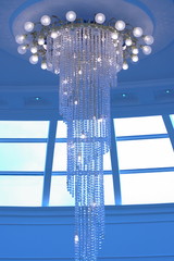 Crystal chandelier in the blue light