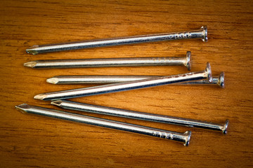 Nails on a wood background