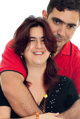 Latin couple in their 30's isolated on a white background