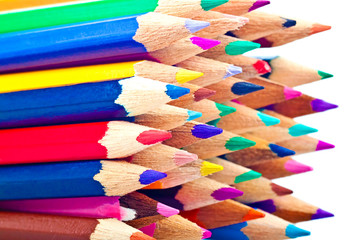 Set of art pencils in bright colors isolated on a white backgrou