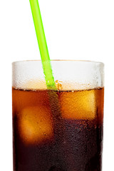 Cola soft drink or Cuba libre with a drinking straw