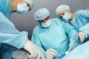 Surgeons operating