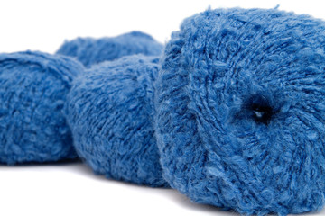 the blue yarn skeins isolated on white