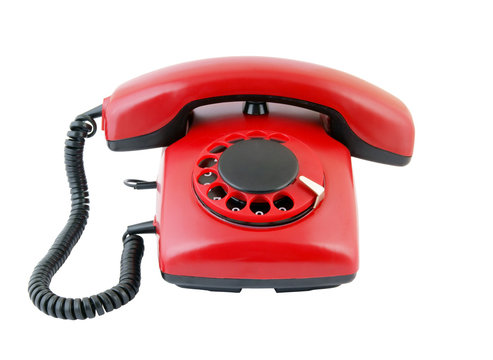 Retro red telephone isolated on white background
