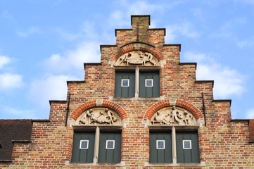 Step-roof gable with antique medical sculptures, Bruges