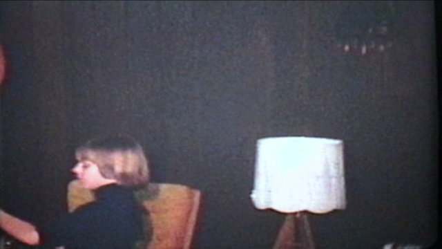 Putting Presents Under Christmas Tree (1978 Vintage 8mm film)