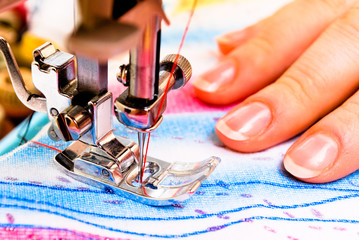 Hand sewing on a machine